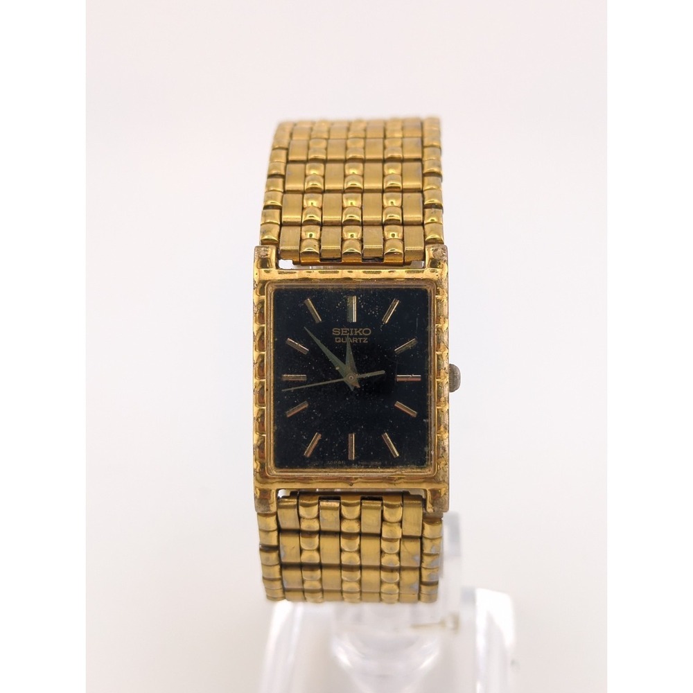 Vintage 1998 Seiko 7N01-5C39 Gold Tank Watch - Black Dial - Working unisex 22mm